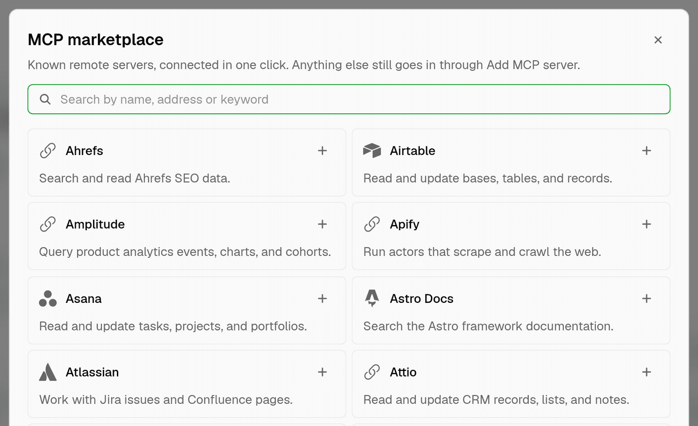 the mcp marketplace with a search box and a two-column catalog of remote servers, each with a one-click install button